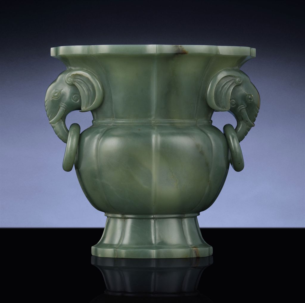 A RARE GREEN JADE ELEPHANTHANDLED VASE, GU , QIANLONG PERIOD (1736