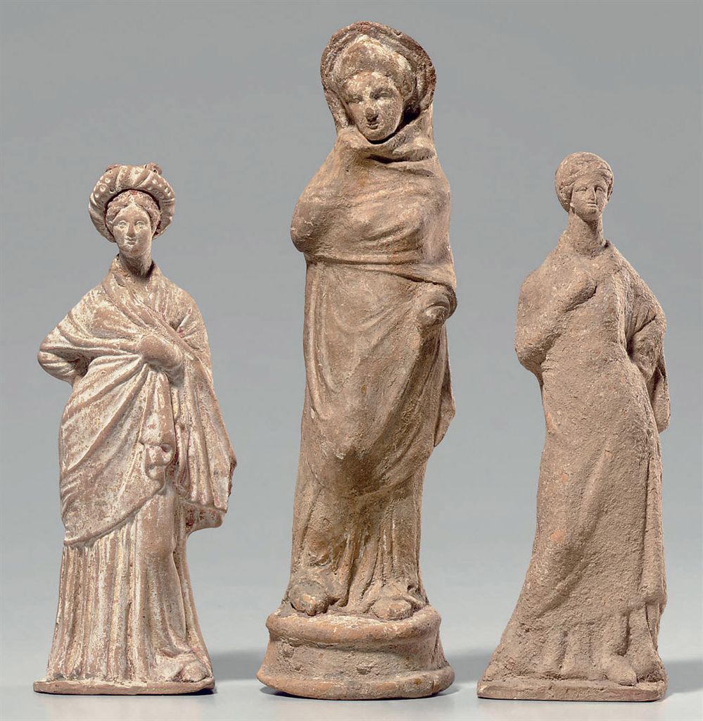 THREE GREEK POTTERY FEMALE FIGURES , CLASSICAL PERIOD TO HELLENISTIC