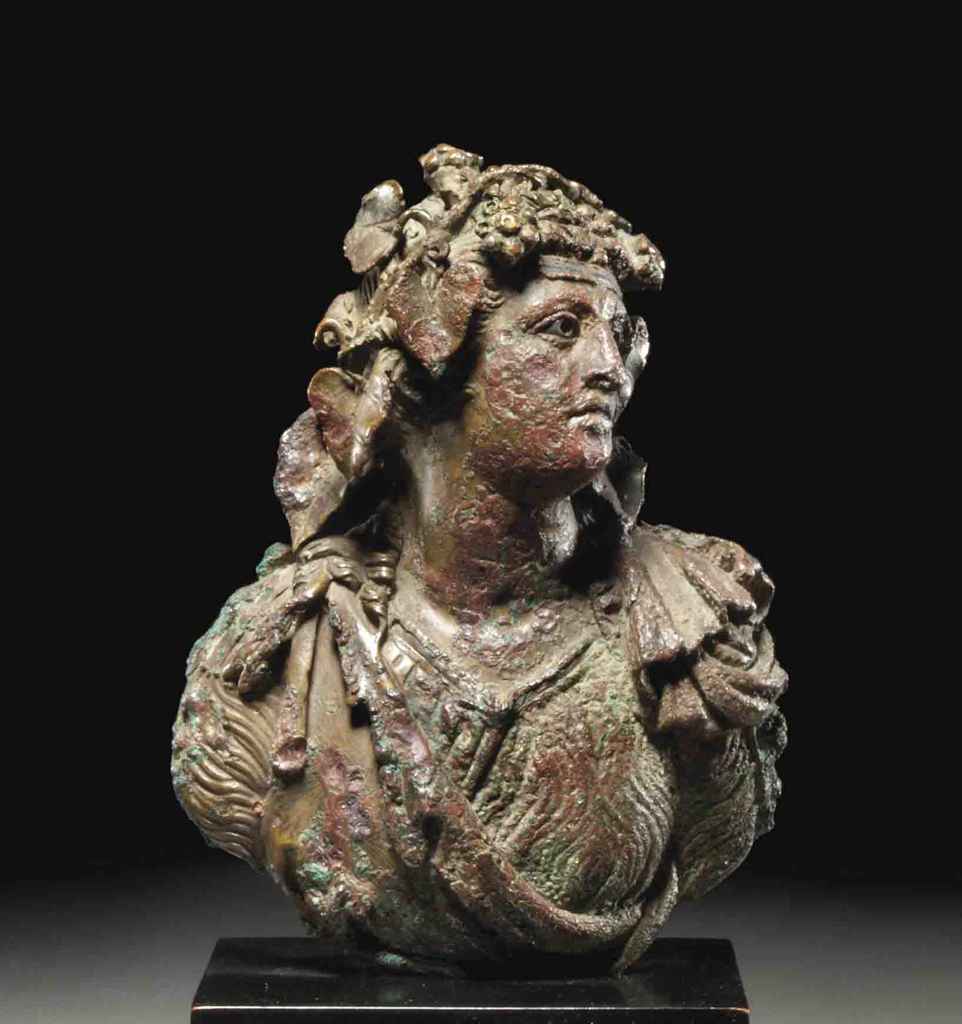 A GREEK BRONZE BUST OF DIONYSOS , LATE HELLENISTIC PERIOD, CIRCA 2ND