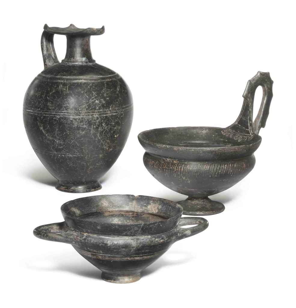 THREE ETRUSCAN BUCCHERO VESSELS , CIRCA 6TH-5TH CENTURY B.C. | Christie's