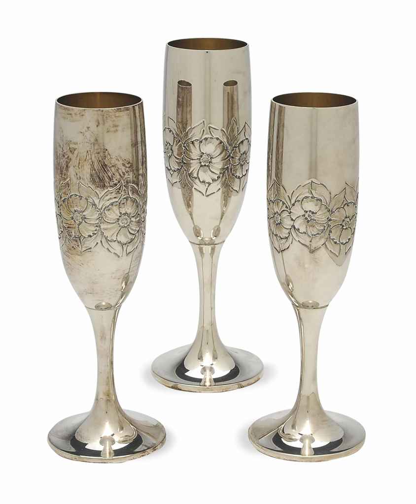A SET OF EIGHTEEN SILVER CHAMPAGNE FLUTES, , 20TH CENTURY, | Christie&rsquo;s