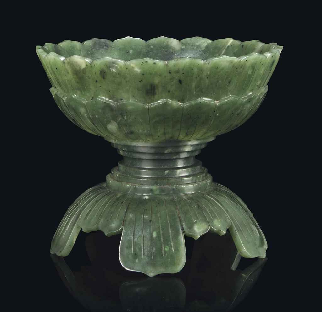 A CHINESE SPINACH JADE LOTUSFORM STEM BOWL , 19TH CENTURY Christie's