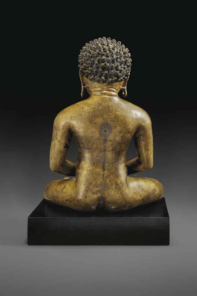 A RARE AND IMPORTANT BRONZE FIGURE OF A SEATED YOGI, POSSIBLY PADAMPA