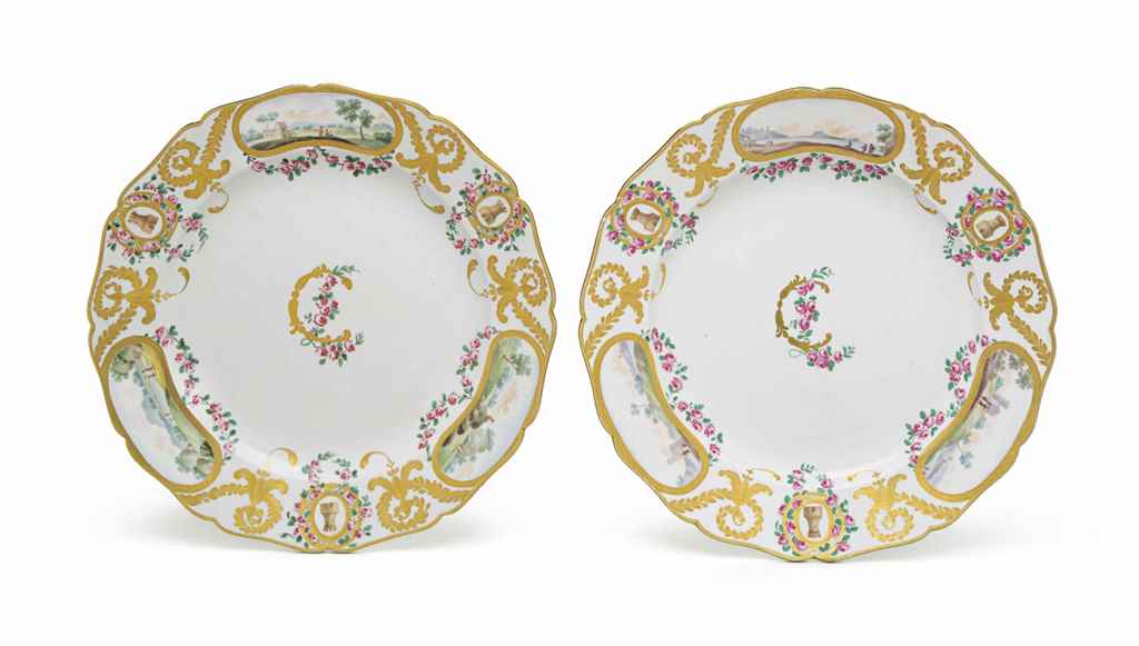 A PAIR OF SPANISH (BUEN RETIRO) PORCELAIN MONOGRAMMED PLATES , CIRCA