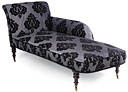 A Victorian ebonised chaise lounge