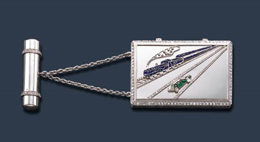 A superb Art Deco gem-set ‘Train Bleu’ vanity case, by Van Cleef & Arpels, signed Van Cleef & Arpels, Paris, No. 61063. Sold for $44,650 on 22-23 October 2001  at Christie’s in New York