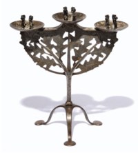 A POLISHED STEEL RUSSELL & SONS 'LYGON' CANDELABRUM DESIGNED BY GORDON RUSSELL
CIRCA 1925