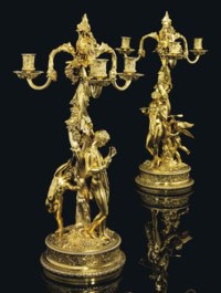 AN IMPORTANT PAIR OF GEORGE IV SILVER-GILT THREE-LIGHT CANDELABRA