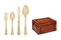 A GEORGE III SILVER-GILT DESSERT-SERVICE