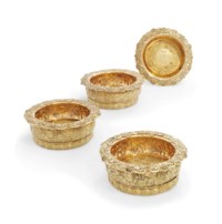 A SET OF FOUR GEORGE IV SILVER-GILT WINE-COASTERS FROM THE SAMPAIO SERVICE