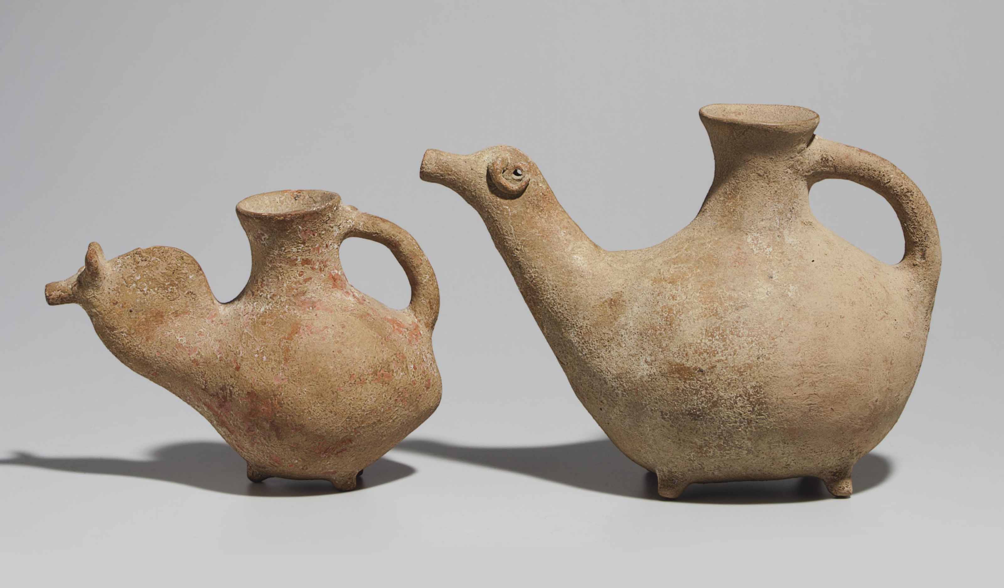 TWO PARTHIAN POTTERY ZOOMORPHIC VESSELS , CIRCA 3RD1ST CENTURY B.C