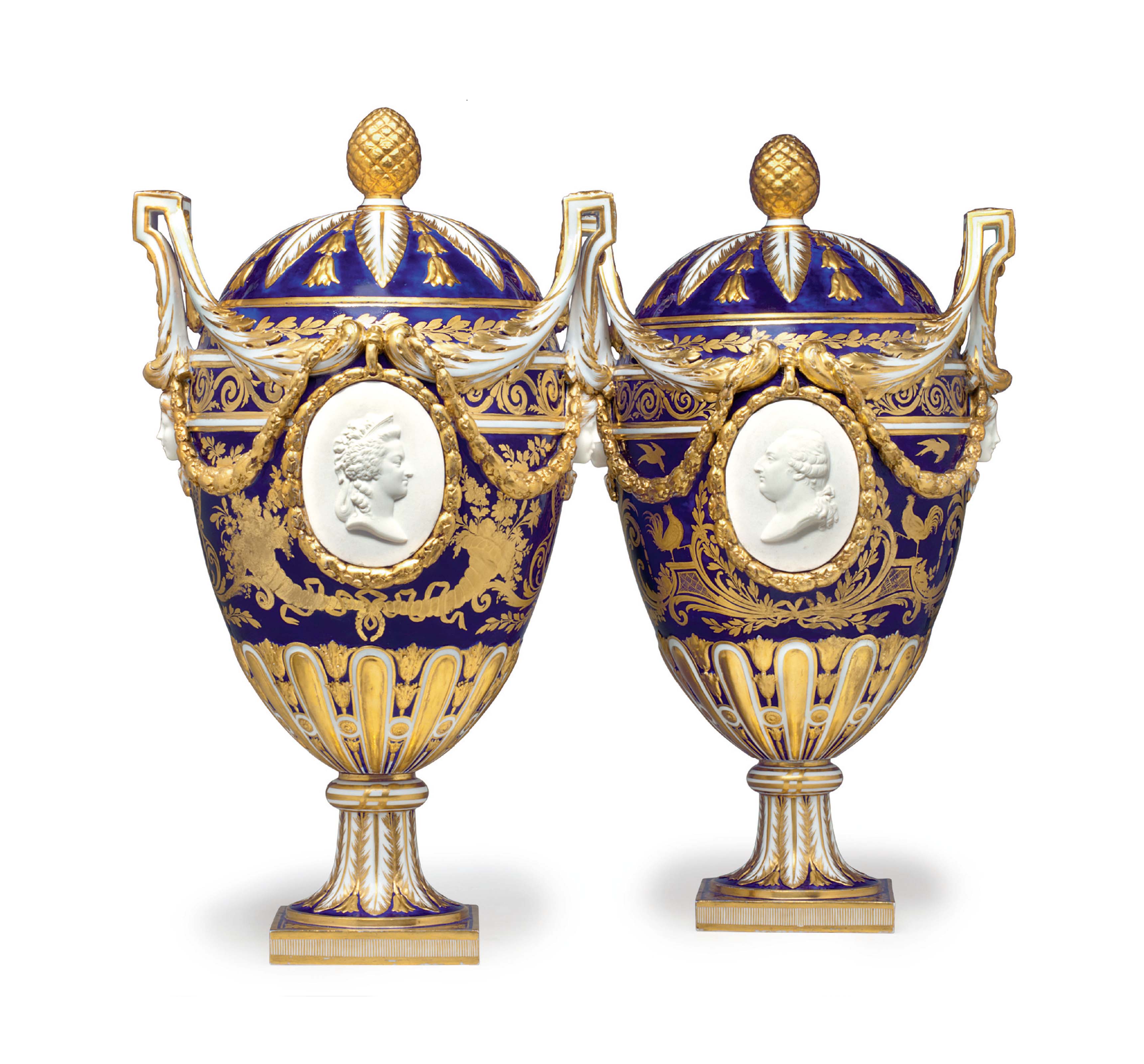 A PAIR OF SEVRES PORCELAIN BLEU NOUVEAU TWOHANDLED VASES AND COVERS