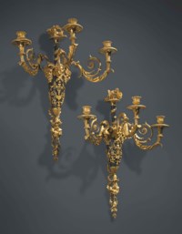 A PAIR OF LOUIS XVI ORMOLU AND PATINATED BRONZE THREE-BRANCH WALL-LIGHTS