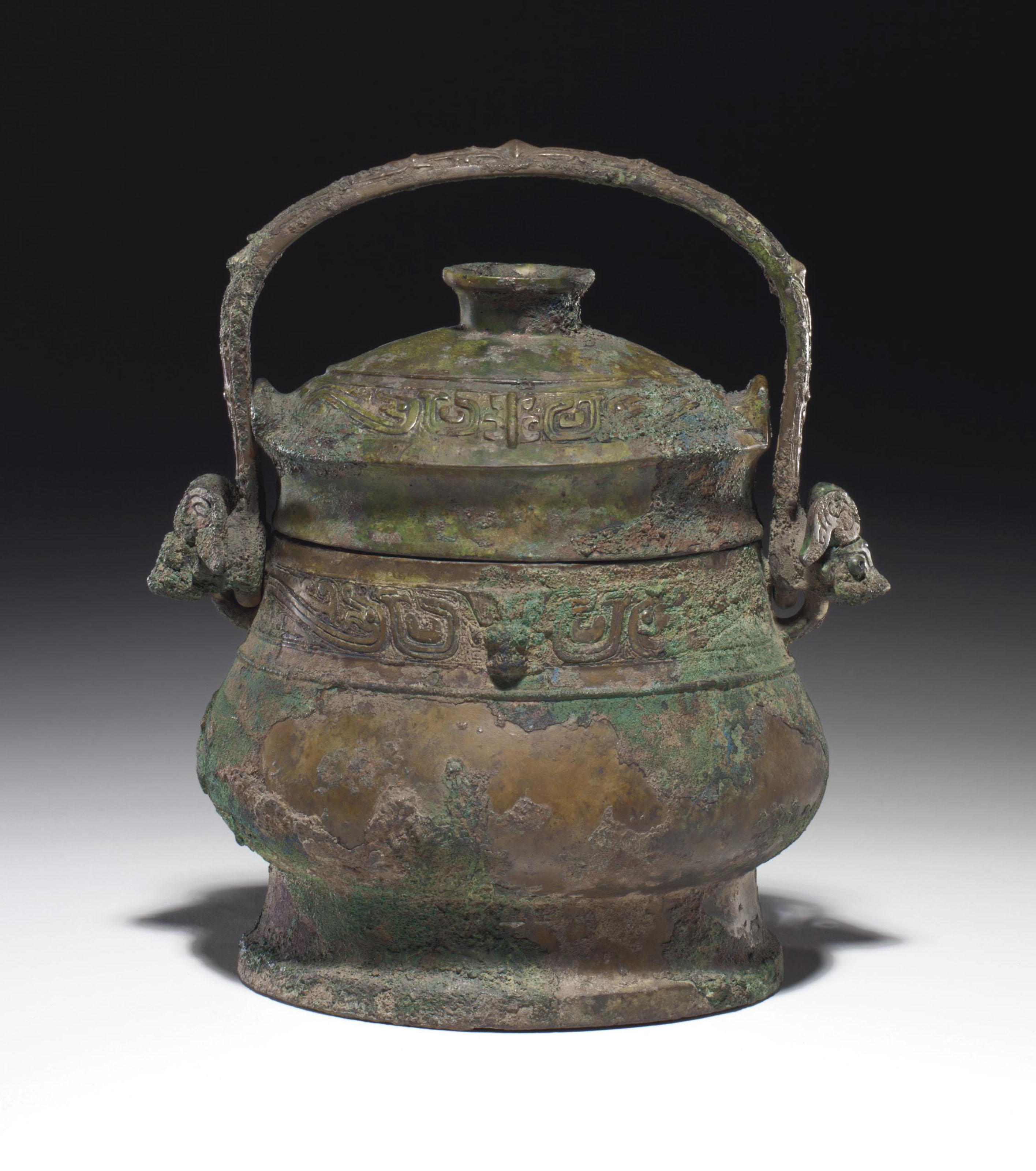 A BRONZE RITUAL WINE VESSEL AND COVER, YOU , EARLY WESTERN ZHOU DYNASTY