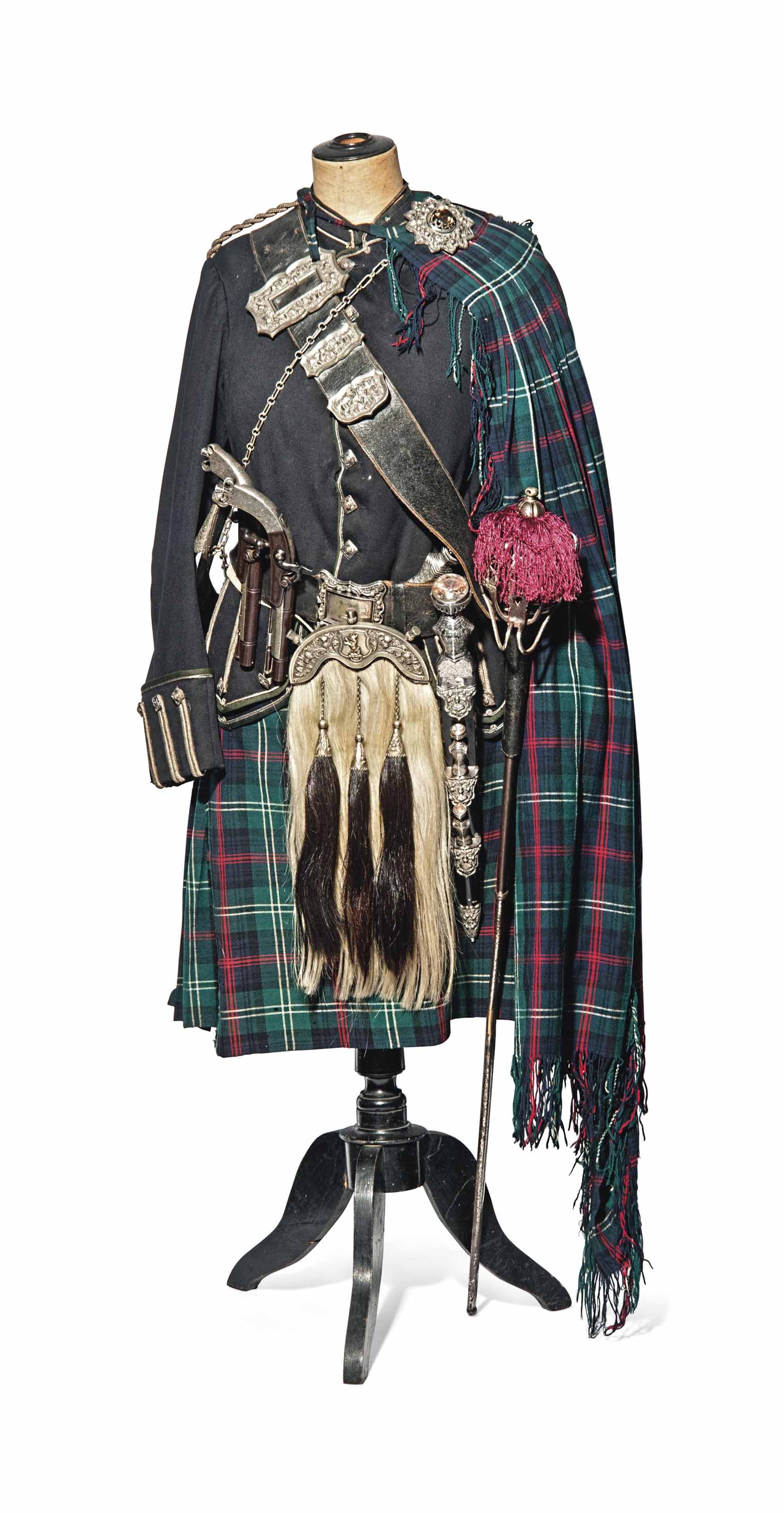 A HIGHLAND DRESS OUTFIT INCLUDING PERCUSSION DRESS PISTOLS A BASKET