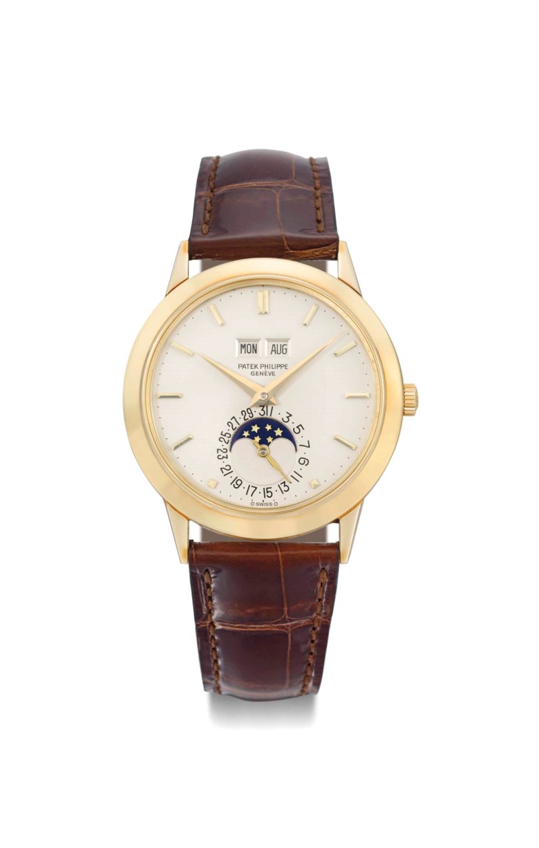 Patek Philippe. A very fine, extremely rare and historically important 18K gold automatic perpetual calendar wristwatch with moon phases, Signed Patek Philippe, Genève, ref. 3450, movement no. 1119586, case no. 2788611, manufactured in 1981. 37.5  mm  diam. Sold for CHF 287,000 on 12 May 2014  at Christie’s in Geneva