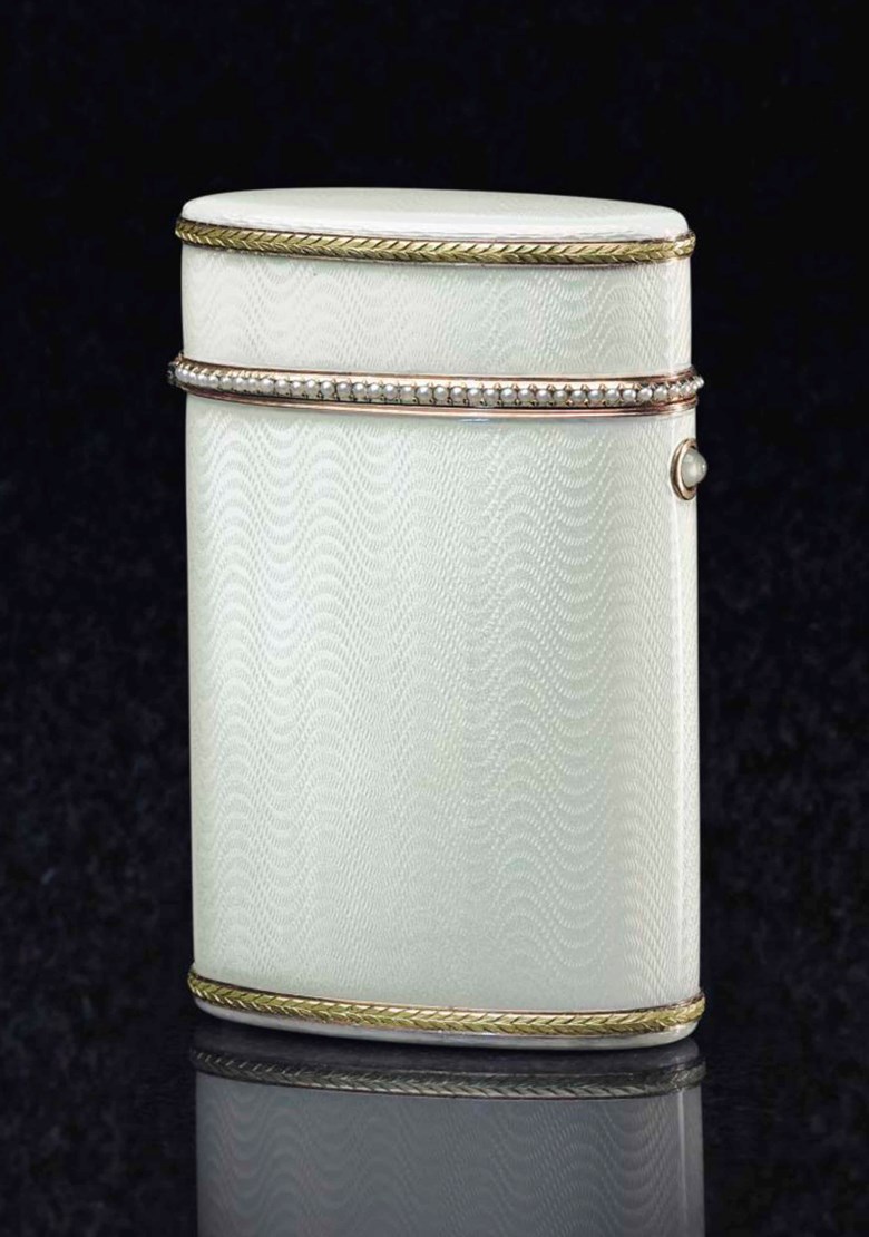 A gem-set gold-mounted, silver-gilt and guilloché enamel cigarette case, by Fabergé, with the workmasters mark of Henrik Wigström, St. Petersburg, 1908-1917, scratched inventory number 21854. 3½  in (9  cm) high. Sold for $32,500 on 20 May 2015  at Christie’s in New York