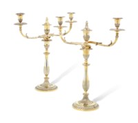 A PAIR OF GEORGE III SILVER-GILT CANDELABRA