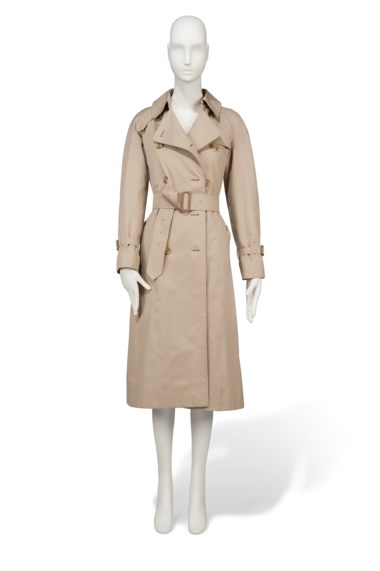 A three-quarter length trench coat, Burberry, early 1980s. Estimate £6,000-9,000. This lot is offered in Audrey Hepburn The Personal Collection on 27 September 2017  at Christie’s in London