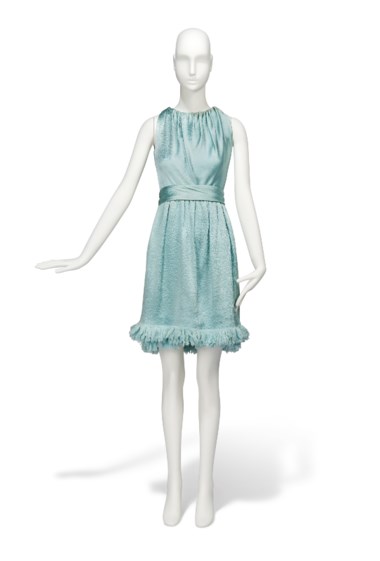 Two for the Road, 1967
a pale blue cloque satin cocktail gown, Givenchy couture, autumn-winter, 1966-67, gathered onto the neck, with wrapped cummerbund belt, couture tag 33387, worn by audrey hepburn in publicity portraits for the 1967 20th Century Fox production Two for the Road. Estimate £10,000-15,000. This lot is offered in Audrey Hepburn The Personal Collection on 27 September 2017  at