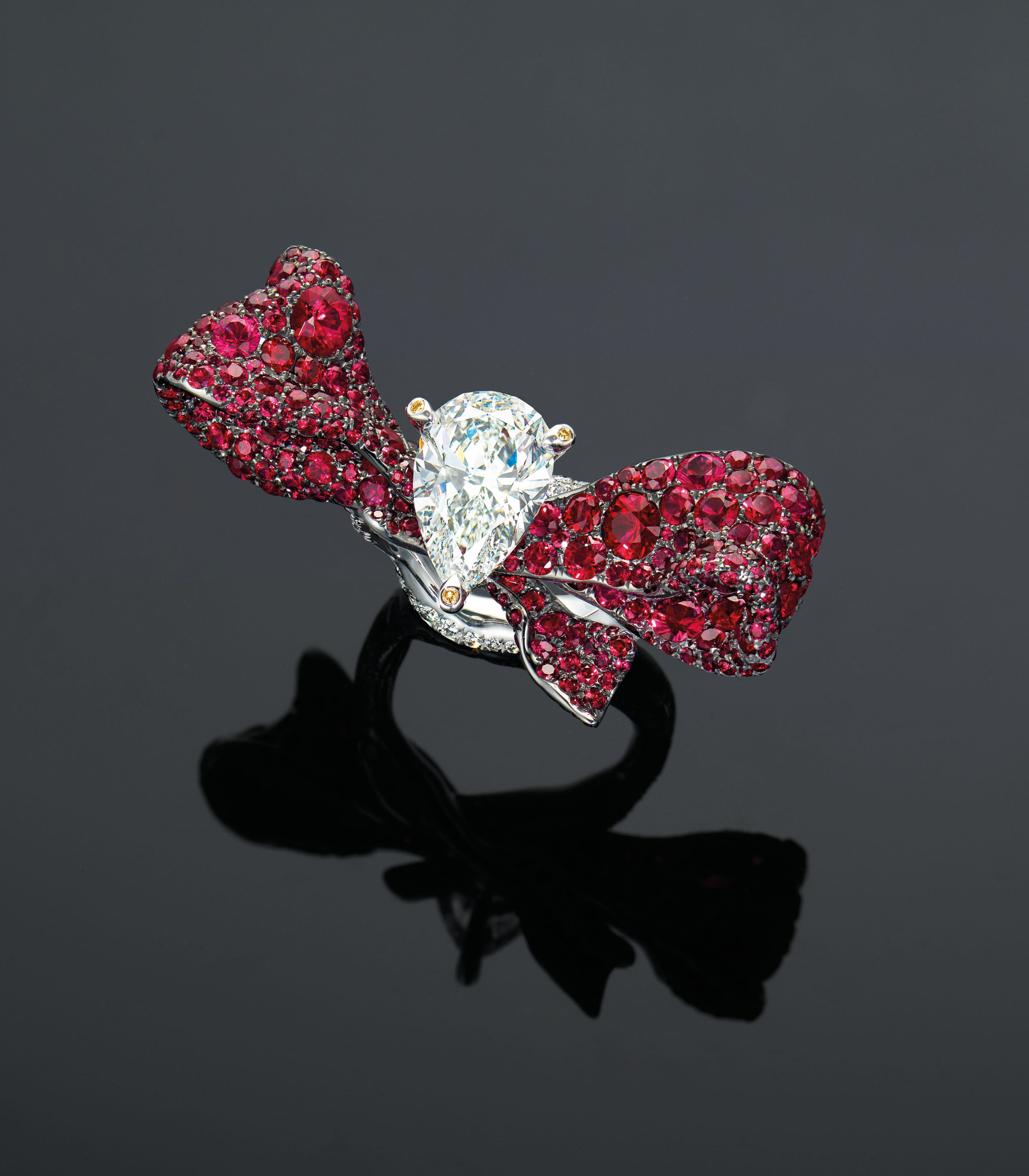AN ELEGANT DIAMOND, RUBY AND COLOURED DIAMOND RING, BY CINDY CHAO