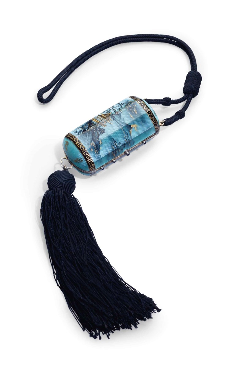An Art Deco chinoiserie, 18k gold, enamel and sapphire-mounted vanity case, Mark of Van Cleef and Arpels, Paris, circa 1928. 3½  in (8.9  cm) long, the case. This lot was offered in THE COLLECTOR 19th Century Furniture, Sculpture, Works of Art, Ceramics & Silver on 17 October 2017  at Christie’s in New York