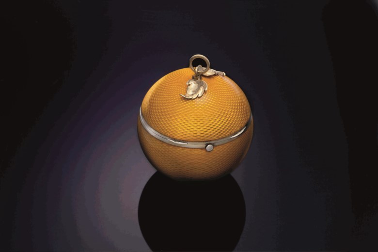 A silver and enamel fruit-form pomander, Mark of Van Cleef and Arpels, Paris, second quarter 20th century. 2⅝  in (6.7  cm) diameter. This lots was offered in THE COLLECTOR 19th Century Furniture, Sculpture, Works of Art, Ceramics & Silver on 17 October 2017  at Christie’s in New York
