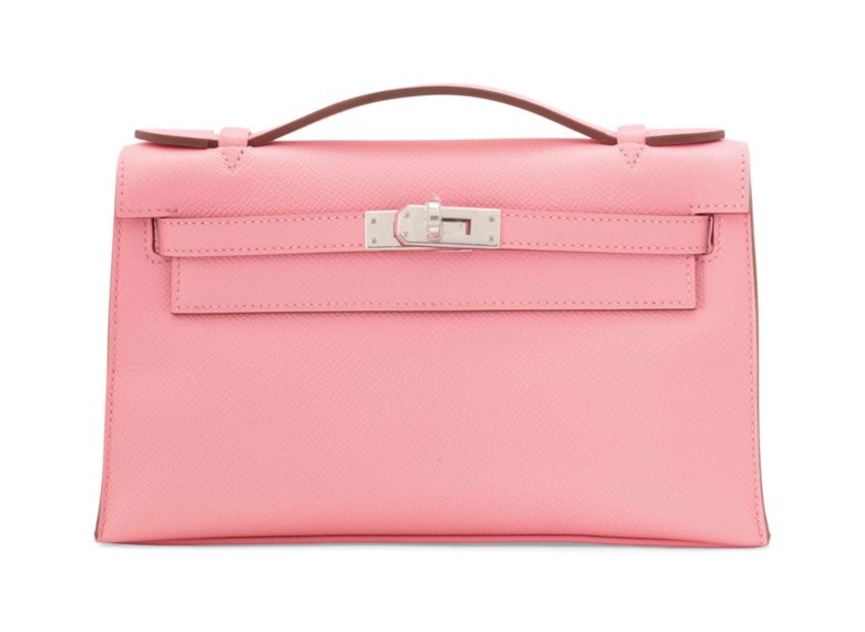 Kelly Pochette in Rose Confetti, Hermès, 2016. 22 x 13 x 6  cm. Estimate €3,000-4,000. This lot is offered in Sacs & Accessoires on 12 December 2017  at Christie’s in Paris
