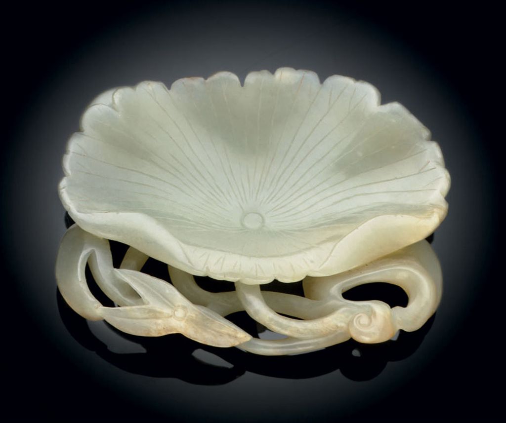 A RARE SMALL WHITE JADE LOTUS LEAF FORM BRUSH WASHER JIN DYNASTY 