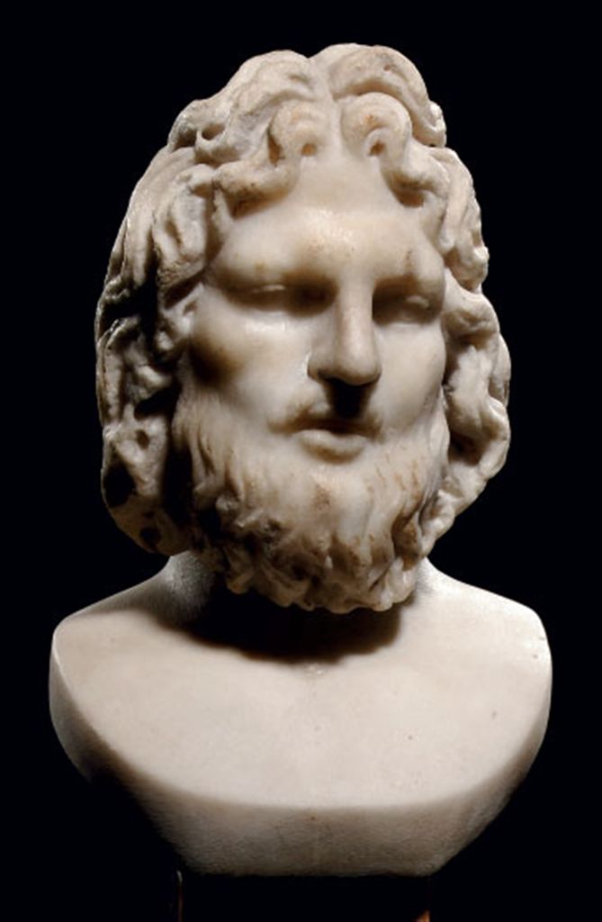 A ROMAN MARBLE BUST OF ZEUS