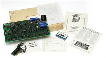 APPLE-1 -- Personal Computer. An Apple-1 motherboard, number 82, printed label to reverse, with a few slightly later additions including a 6502 microprocessor, labeled R6502P  R6502-11  8145, printed circuit board with 4 rows A-D and columns 1-18, three capacitors, heatsink, cassette board connector, 8K bytes of RAM, keyboard interface, firmware in PROMS, low-profile sockets on all integrated circuits, video terminal, breadboard area with slightly later connector, with later soldering, wires and electrical tape to reverse, printed to obverse Apple Computer 1  Palo Alto. Ca. Copyright 1976.