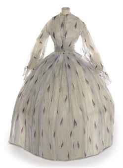 A DAY DRESS OF STARCHED ORGANDY  