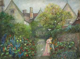 A lady in the garden at Kelmscott Manor, Gloucestershire  