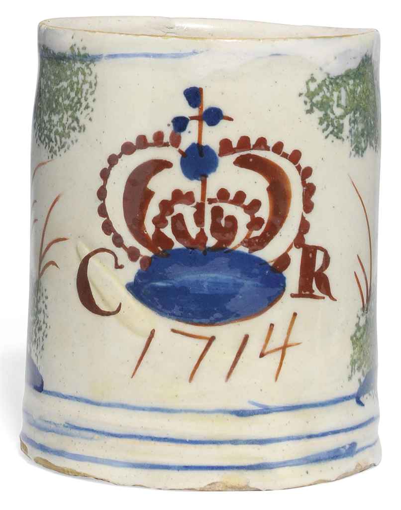 AN ENGLISH DELFT POLYCHROME DATED ROYAL COMMEMORATIVE MUG