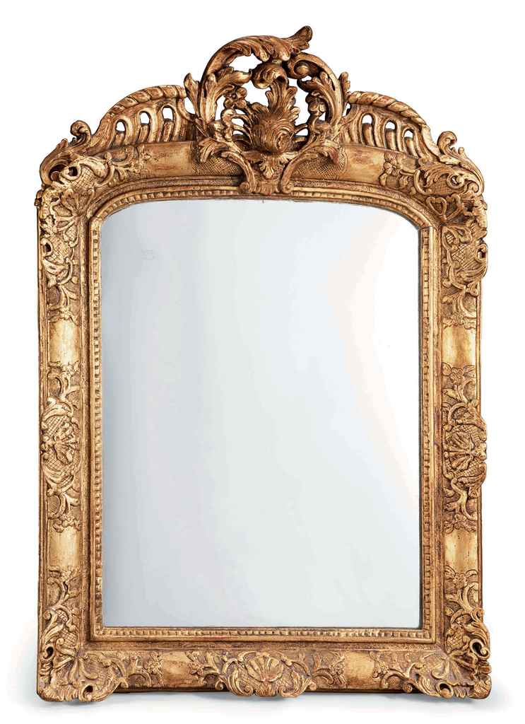 MIROIR DANS UN CADRE DE STYLE LOUIS XV , COMPRENANT DES ELEMENTS