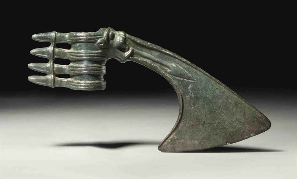 A LURISTAN BRONZE AXE HEAD