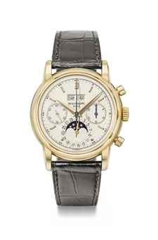Patek Philippe. A very fine and rare 18K gold perpetual calendar chronograph wristwatch with moon phases, original certificate, envelope and box 