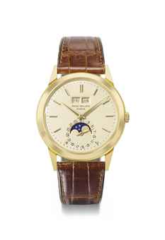 Patek Philippe. A very fine and attractive 18K gold automatic perpetual calendar wristwatch with moon phases 