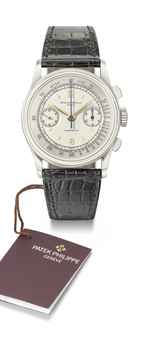 Patek Philippe. An extremely fine, rare and large stainless steel chronograph wristwatch with two-tone silvered dial 