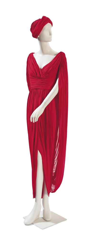 A HALSTON SCARLET SILK JERSEY DRAPED EVENING DRESS AND TURBA...
