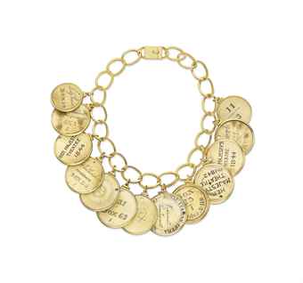 ~AN IVORY AND GOLD NECKLACE  