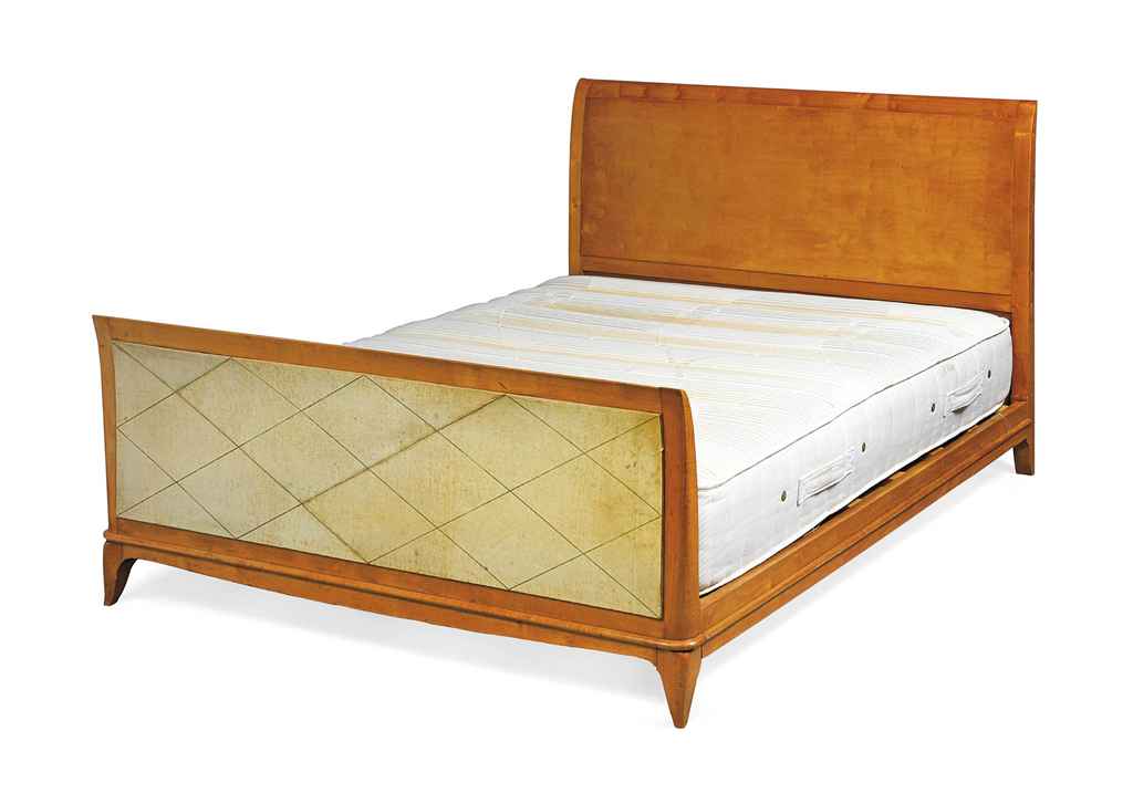 A SYCAMORE AND VELLUM DOUBLE 'SLEIGH' BED , CIRCA 1940S Christie's