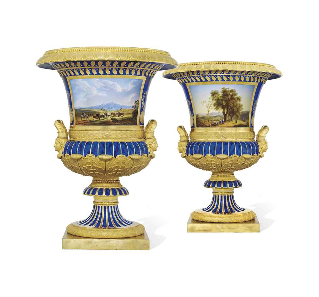 A PAIR OF RARE AND LARGE TWO-HANDLED PORCELAIN VASES