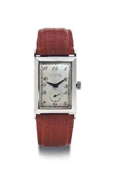 Patek Philippe. An 18k White Gold Curved Rectangular Wristwatch With Breguet Numerals 