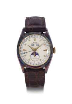 Rolex. An Extremely Fine And Rare 18k Gold Automatic Triple Calendar Wristwatch With Star Dial And Moon Phases 