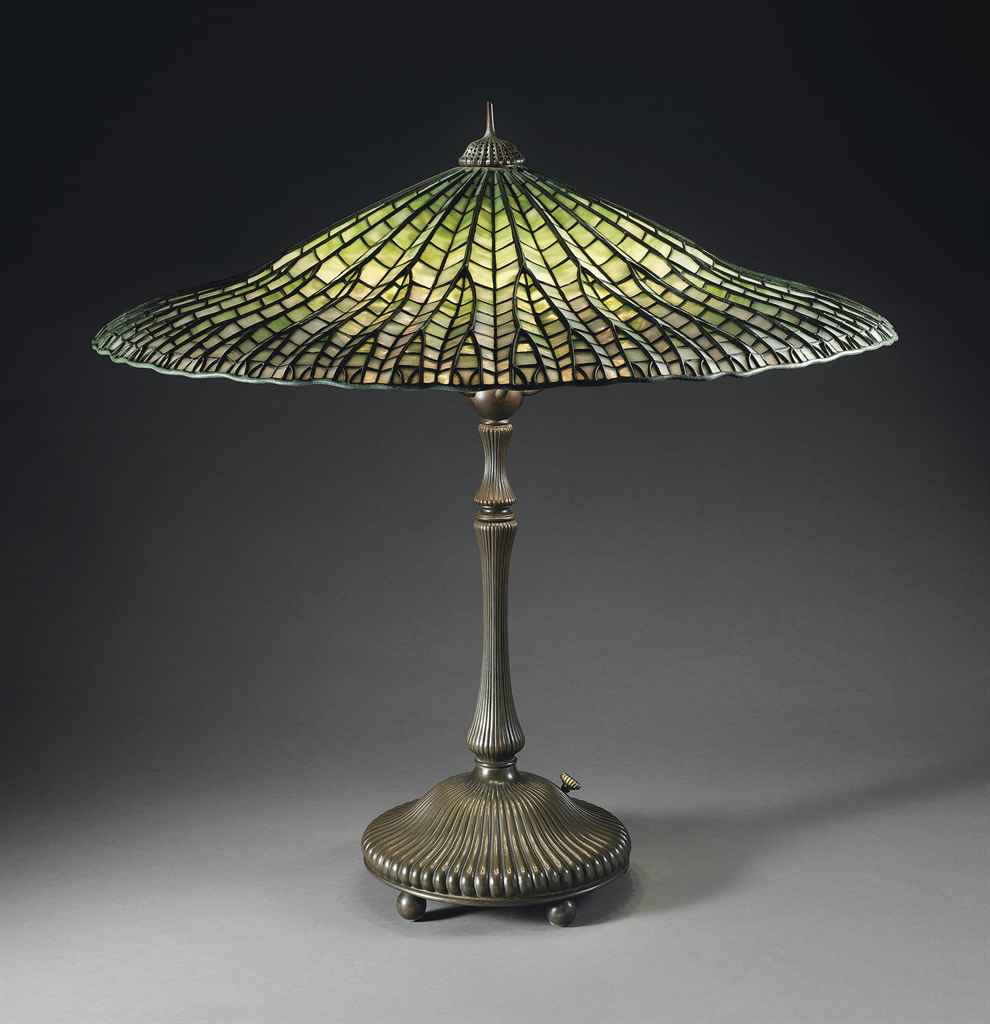 TIFFANY STUDIOS , A 'LOTUS' LEADED GLASS AND BRONZE TABLE ...