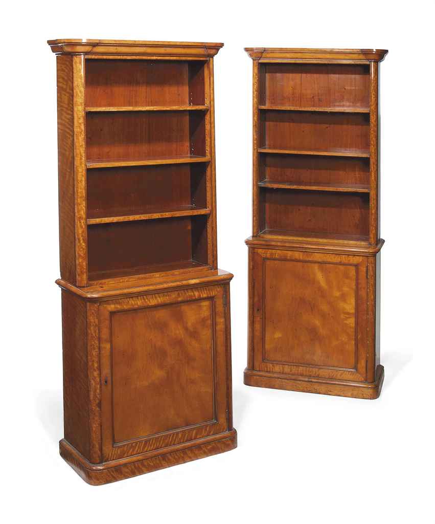 A PAIR OF MID-VICTORIAN SATINWOOD AND TULIPWOOD-BANDED BOOKCASES