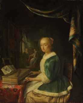 A young lady playing a clavichord  