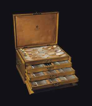 A SILVER FLATWARE SERVICE | MARKED K. FABERGÉ WITH THE IMPERIAL