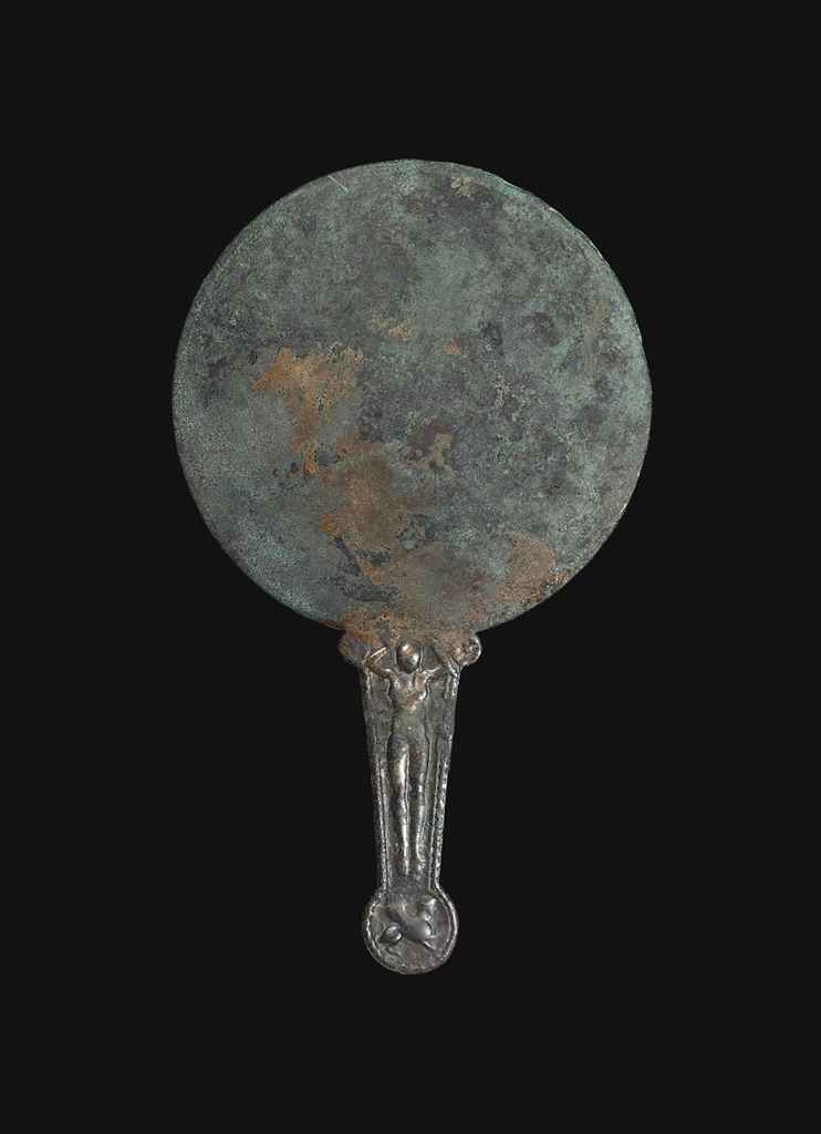 A GREEK BRONZE MIRROR , CLASSICAL PERIOD, CIRCA 5TH CENTURY B.C
